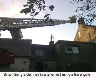 simon installing a chimney flue from a fire engine snorkel